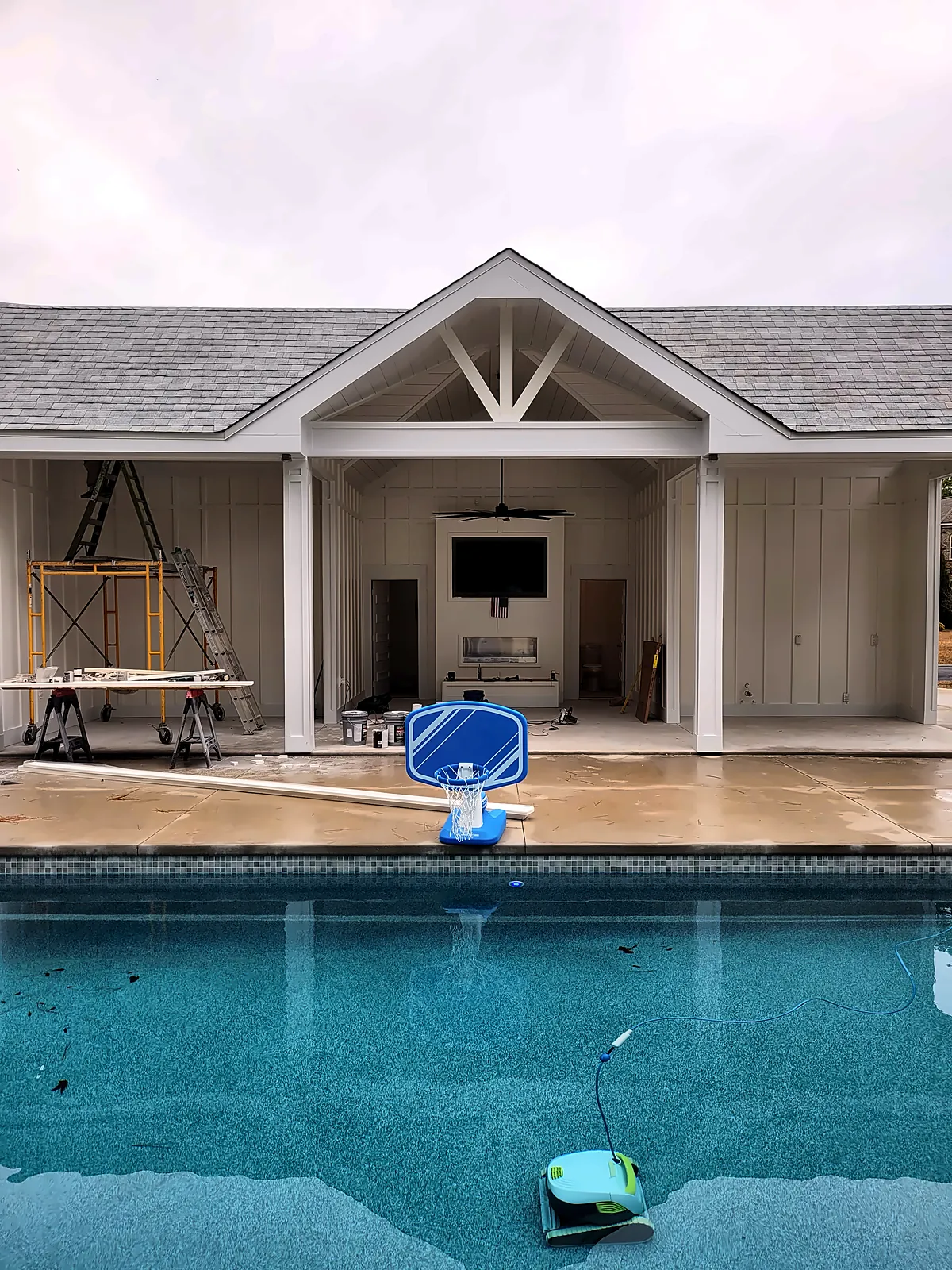 Pool house cabana viewed across the pool